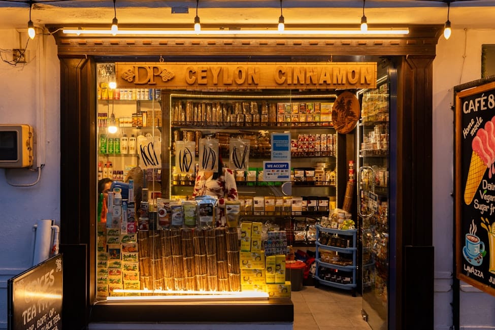 A row of palm trees sitting on top of a sandy beach